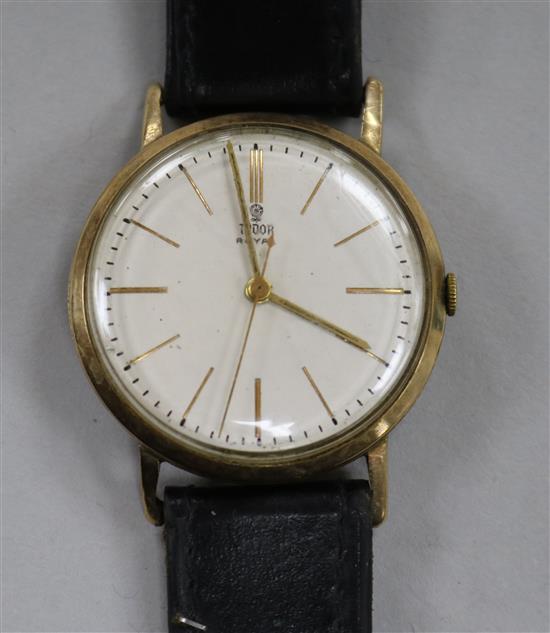A gentlemans yellow metal Tudor Royal manual wind wrist watch.